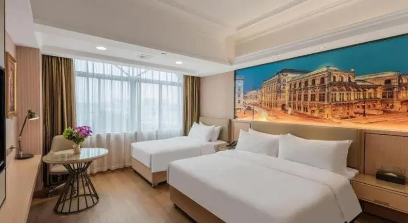 Bed in Vienna Hotel Ganzhou Economic Development Zone 1st Hospital West High-Speed Railway Station Bed in Vienna Hotel Ganzhou Economic Development Zone 1st Hospital West High-Speed Railway Station