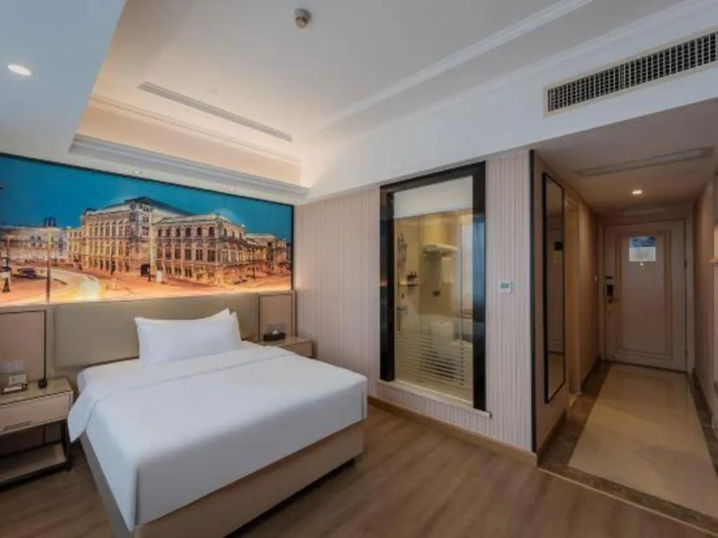 Bed in Vienna Hotel Ganzhou Economic Development Zone 1st Hospital West High-Speed Railway Station