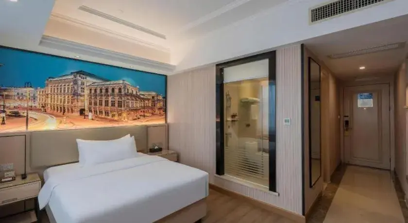Bed in Vienna Hotel Ganzhou Economic Development Zone 1st Hospital West High-Speed Railway Station Bed in Vienna Hotel Ganzhou Economic Development Zone 1st Hospital West High-Speed Railway Station