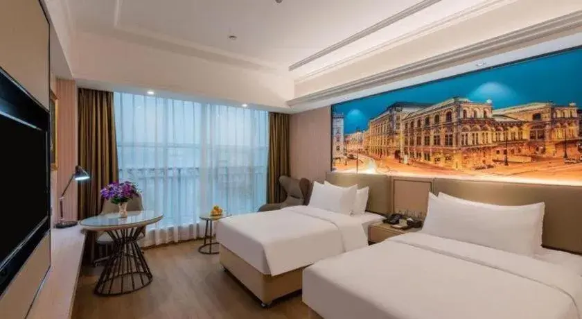 Bed in Vienna Hotel Ganzhou Economic Development Zone 1st Hospital West High-Speed Railway Station Bed in Vienna Hotel Ganzhou Economic Development Zone 1st Hospital West High-Speed Railway Station