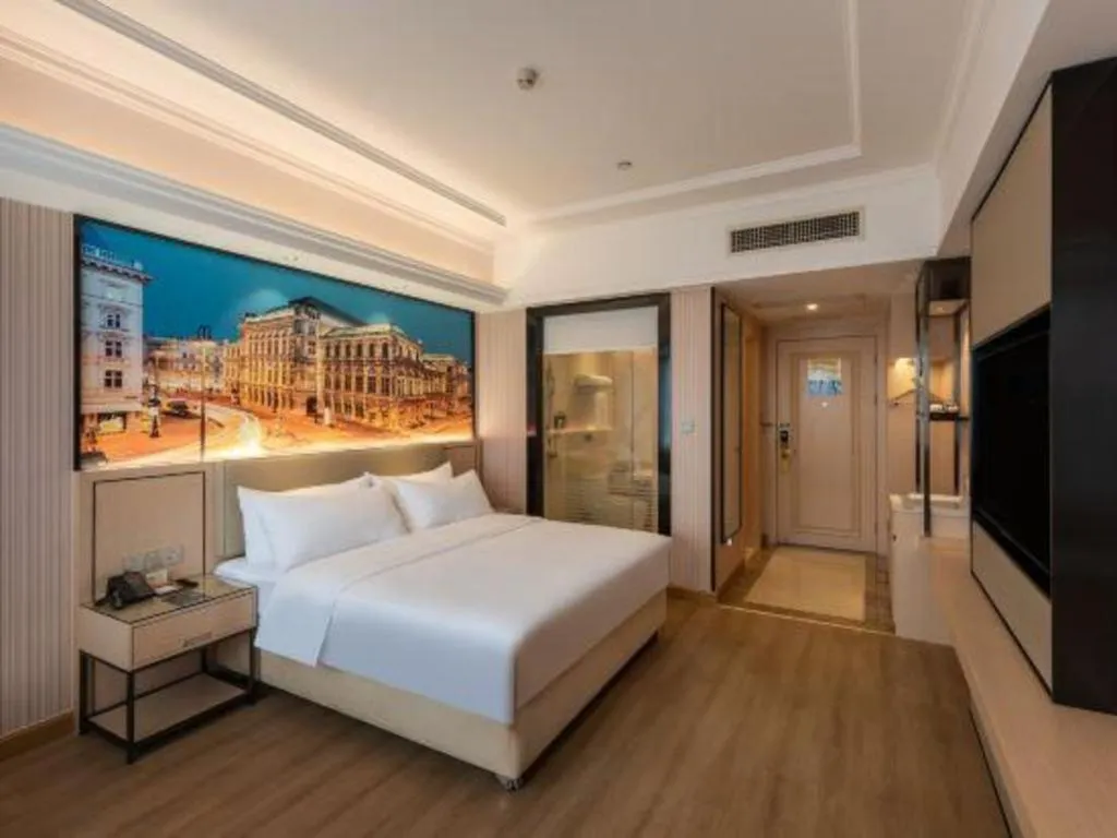 Bed in Vienna Hotel Ganzhou Economic Development Zone 1st Hospital West High-Speed Railway Station