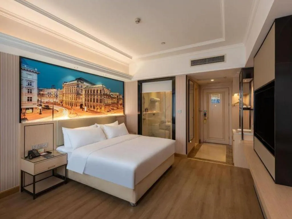 Bed in Vienna Hotel Ganzhou Economic Development Zone 1st Hospital West High-Speed Railway Station