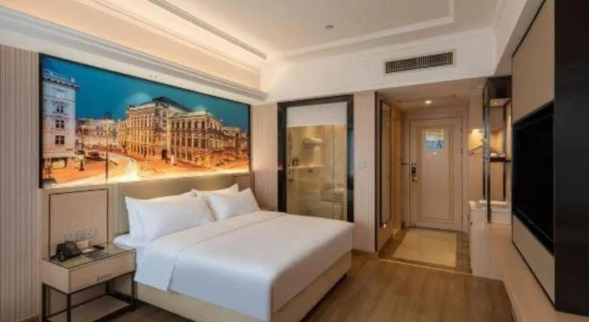 Bed in Vienna Hotel Ganzhou Economic Development Zone 1st Hospital West High-Speed Railway Station