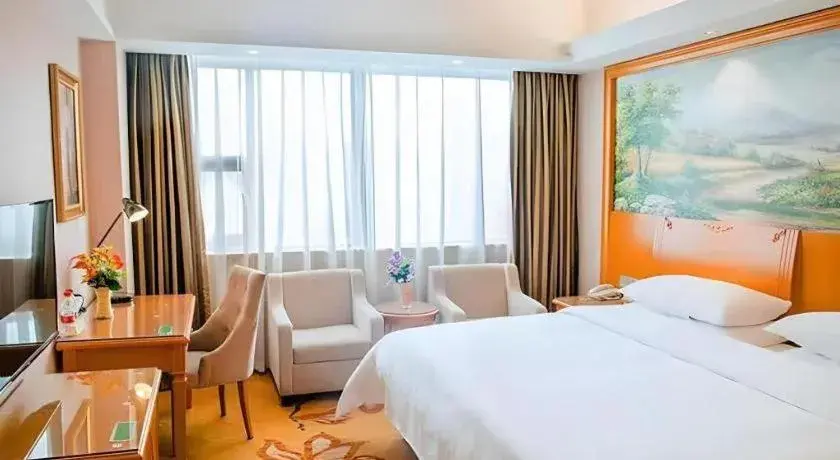 Bed in Vienna Hotel Ganzhou Economic Development Zone 1st Hospital West High-Speed Railway Station Bed in Vienna Hotel Ganzhou Economic Development Zone 1st Hospital West High-Speed Railway Station