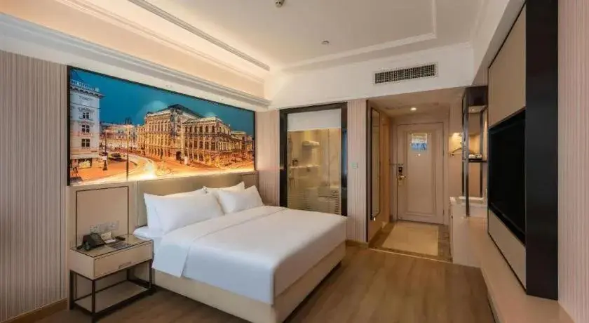 Bed in Vienna Hotel Ganzhou Economic Development Zone 1st Hospital West High-Speed Railway Station Bed in Vienna Hotel Ganzhou Economic Development Zone 1st Hospital West High-Speed Railway Station