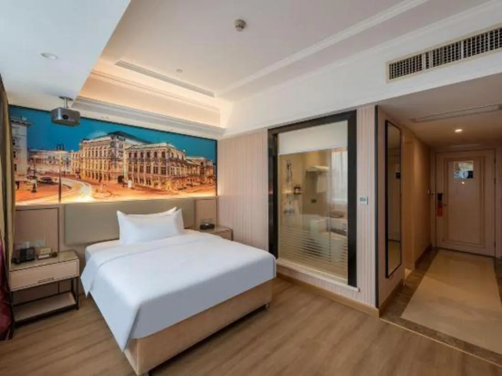 Bed in Vienna Hotel Ganzhou Economic Development Zone 1st Hospital West High-Speed Railway Station