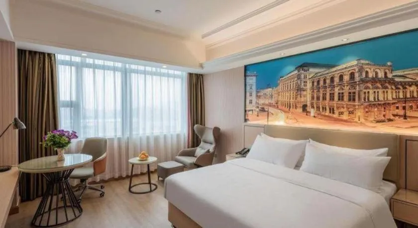 Bed in Vienna Hotel Ganzhou Economic Development Zone 1st Hospital West High-Speed Railway Station