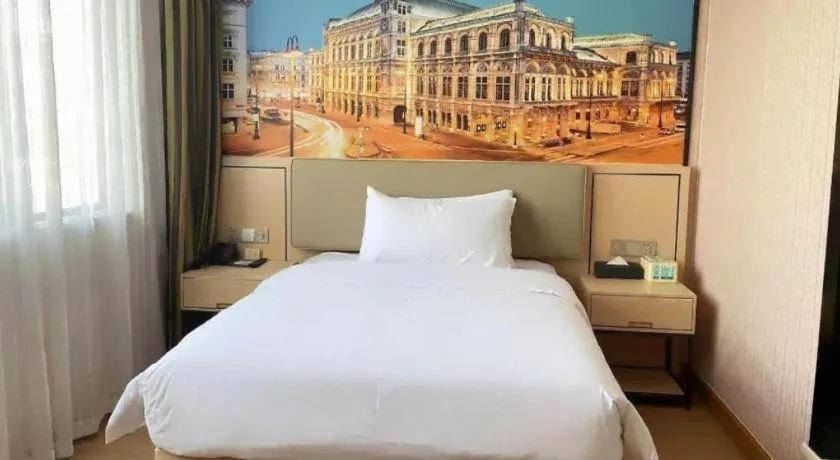 Bed in Vienna Hotel Ganzhou Economic Development Zone 1st Hospital West High-Speed Railway Station