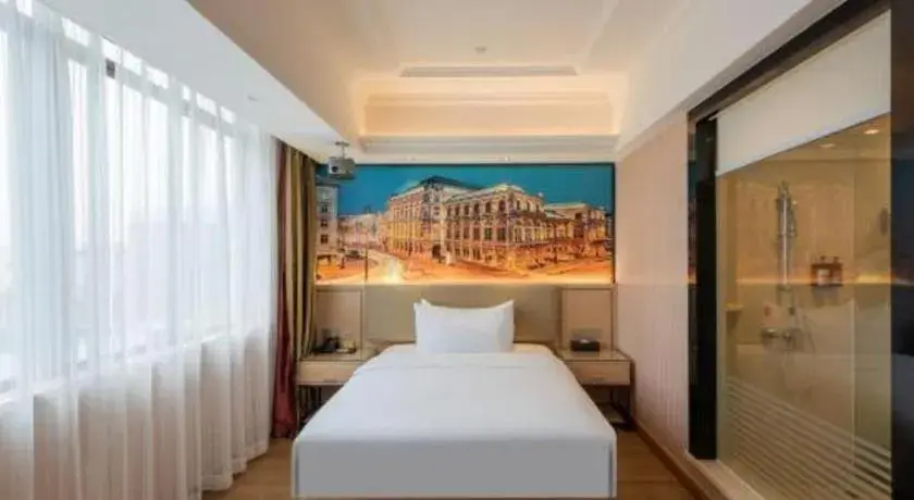 Bed in Vienna Hotel Ganzhou Economic Development Zone 1st Hospital West High-Speed Railway Station Bed in Vienna Hotel Ganzhou Economic Development Zone 1st Hospital West High-Speed Railway Station