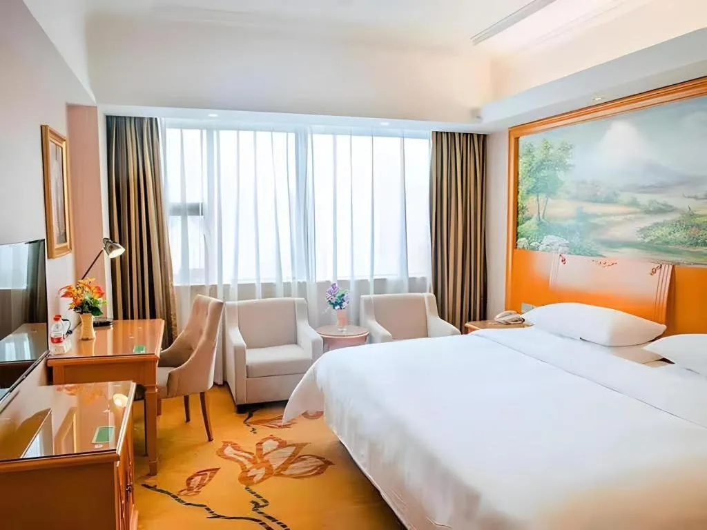Bed in Vienna Hotel Ganzhou Economic Development Zone 1st Hospital West High-Speed Railway Station