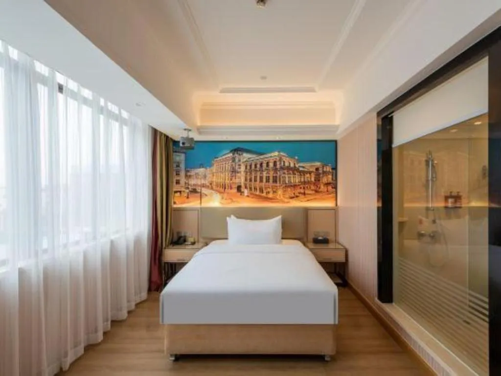 Bed in Vienna Hotel Ganzhou Economic Development Zone 1st Hospital West High-Speed Railway Station
