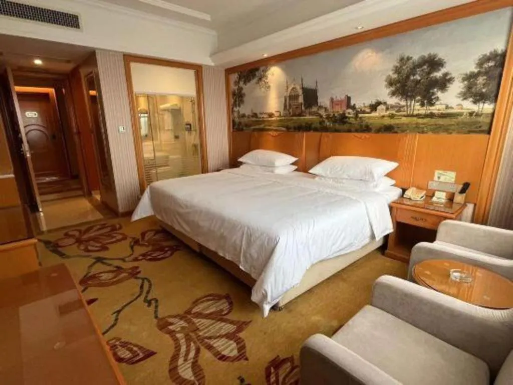 Bed in Vienna Hotel Ganzhou Economic Development Zone 1st Hospital West High-Speed Railway Station