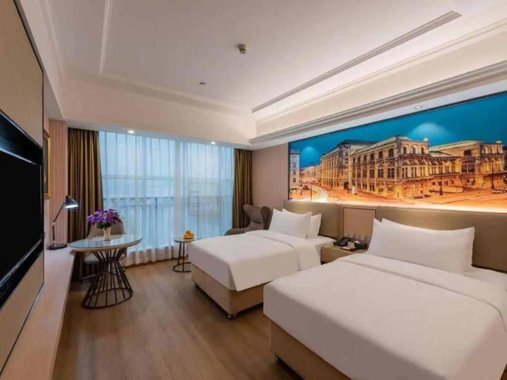 Bed in Vienna Hotel Ganzhou Economic Development Zone 1st Hospital West High-Speed Railway Station