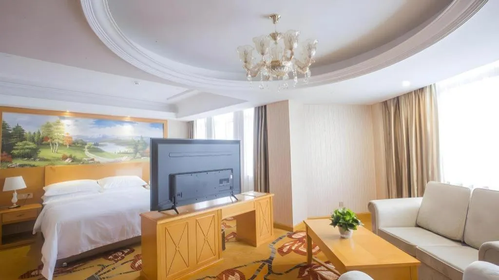 Bed in Vienna Hotel Shanghai Hongqiao National Exhibition Cente Sijing Metro Station