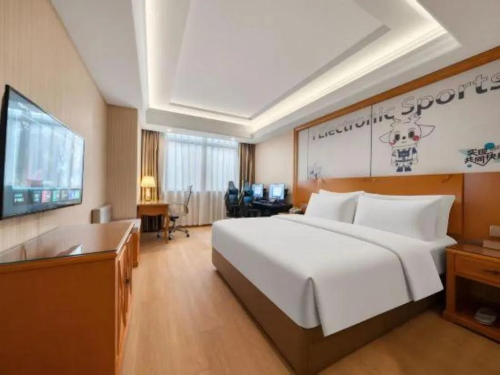 Bed in Vienna Hotel Shanghai Hongqiao National Exhibition Cente Sijing Metro Station