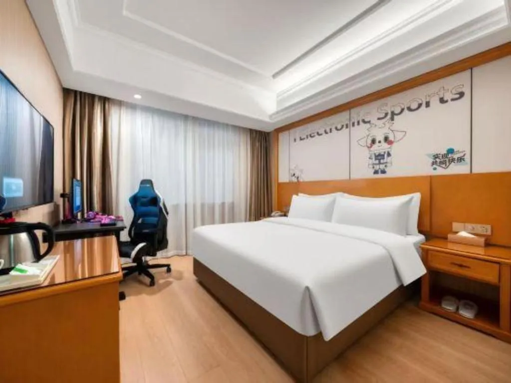 Bed in Vienna Hotel Shanghai Hongqiao National Exhibition Cente Sijing Metro Station