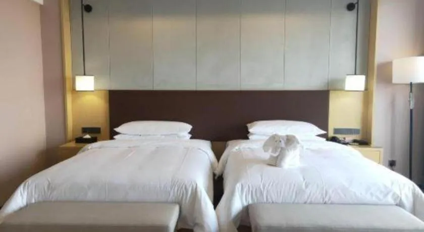 Bed in Venus Royal Hotel Ordos Yijinhuoluo Banner Olympic