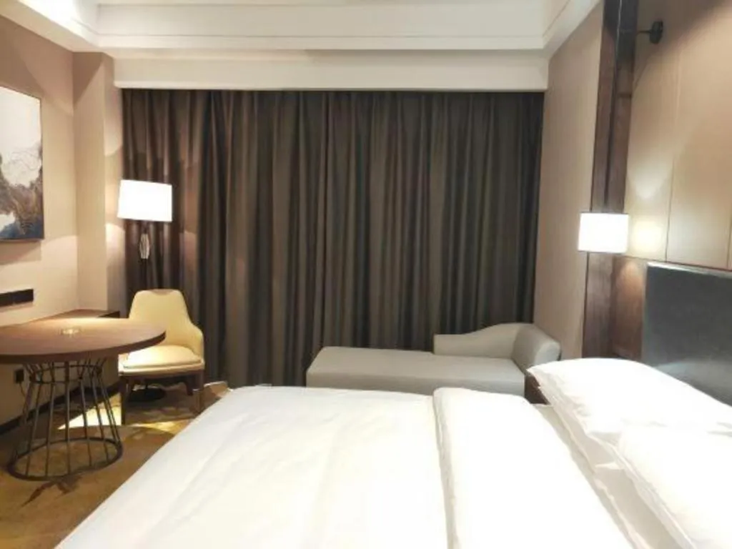 Bed in Venus Royal Hotel Ordos Yijinhuoluo Banner Olympic