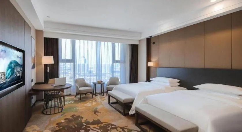 Bed in Venus Royal Hotel Ordos Yijinhuoluo Banner Olympic