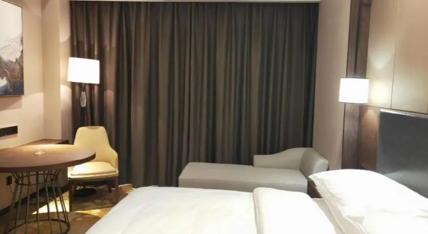 Bed in Venus Royal Hotel Ordos Yijinhuoluo Banner Olympic