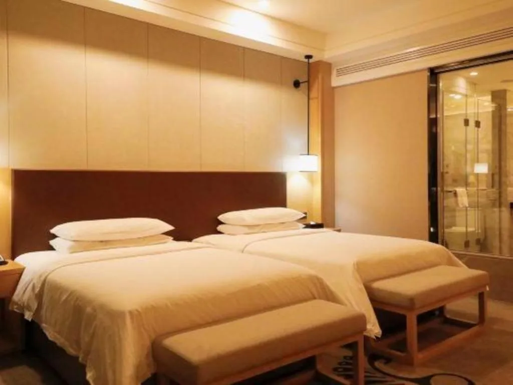 Bed in Venus Royal Hotel Ordos Yijinhuoluo Banner Olympic