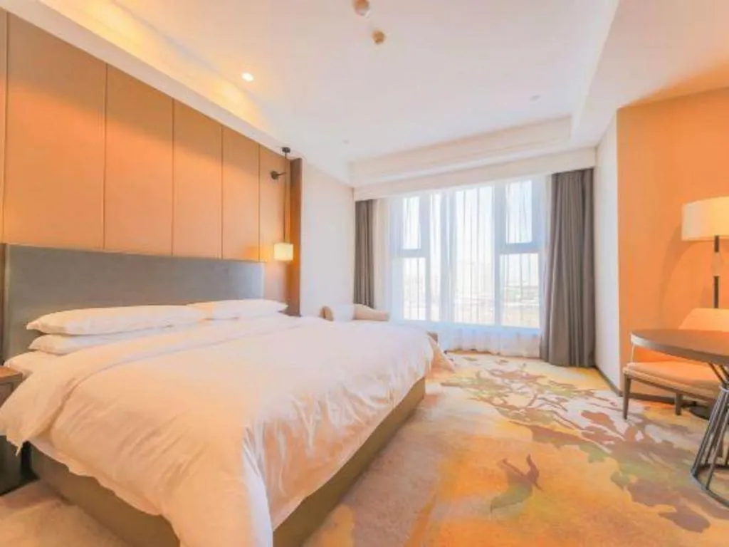 Bed in Venus Royal Hotel Ordos Yijinhuoluo Banner Olympic