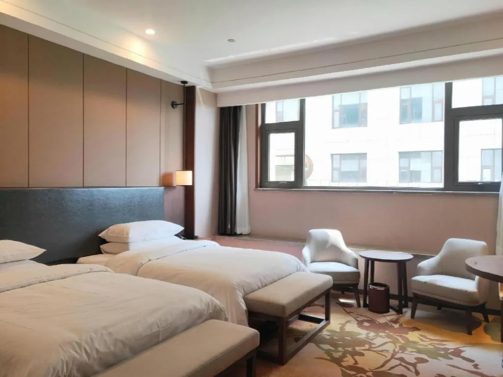 Bed in Venus Royal Hotel Ordos Yijinhuoluo Banner Olympic