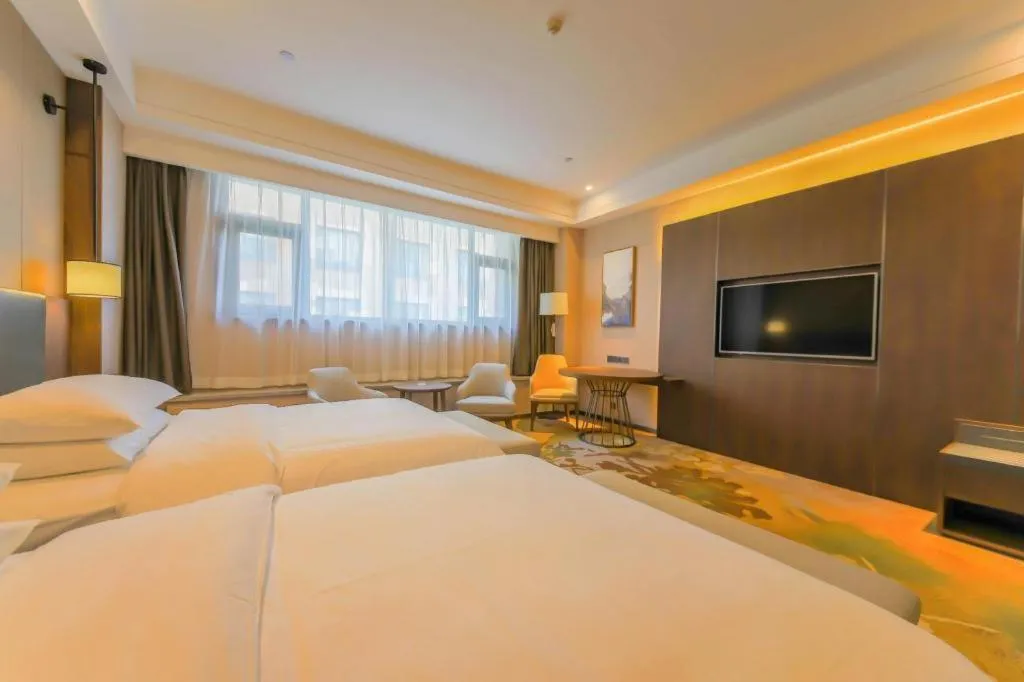 Bed in Venus Royal Hotel Ordos Yijinhuoluo Banner Olympic