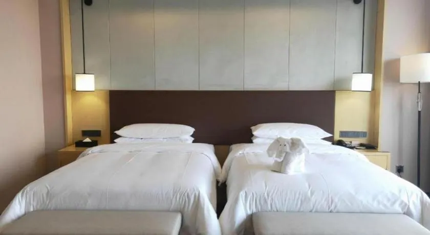 Bed in Venus Royal Hotel Ordos Yijinhuoluo Banner Olympic