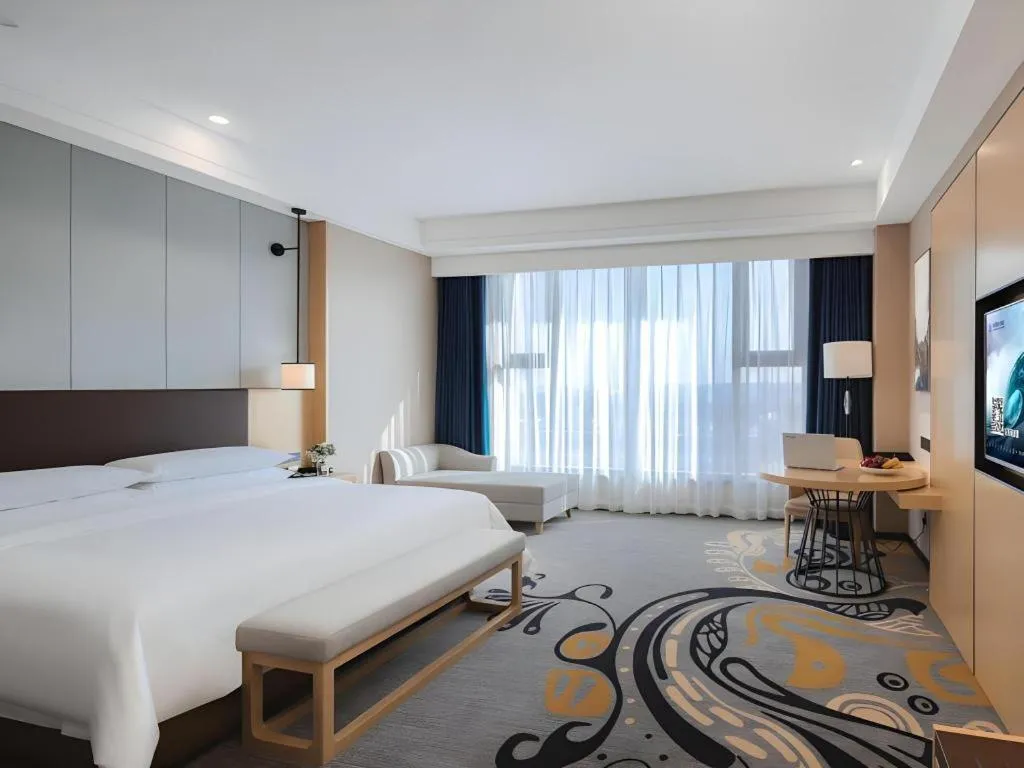 Bed in Venus Royal Hotel Ordos Yijinhuoluo Banner Olympic