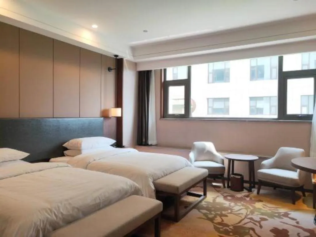 Bed in Venus Royal Hotel Ordos Yijinhuoluo Banner Olympic