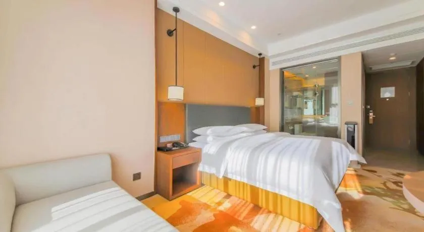 Bed in Venus Royal Hotel Ordos Yijinhuoluo Banner Olympic