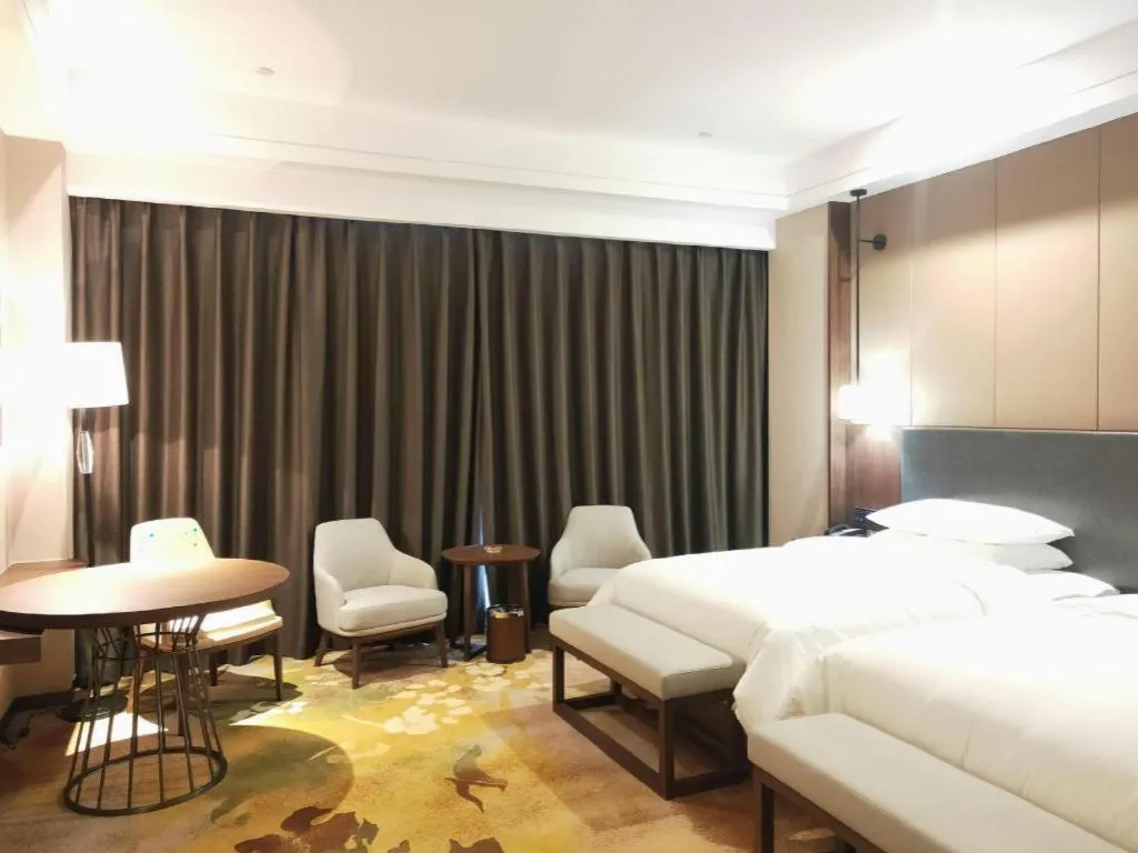 Bed in Venus Royal Hotel Ordos Yijinhuoluo Banner Olympic