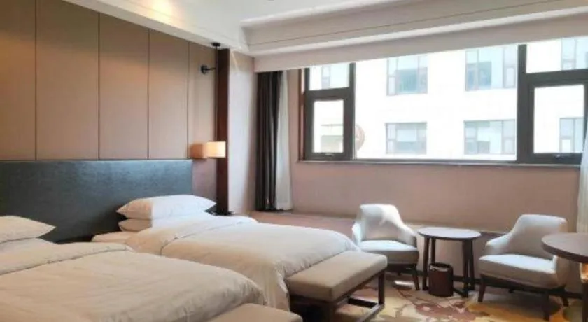 Bed in Venus Royal Hotel Ordos Yijinhuoluo Banner Olympic