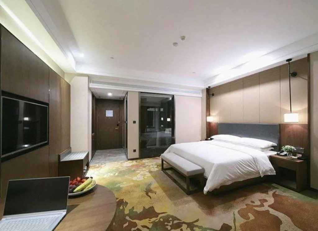 Bed in Venus Royal Hotel Ordos Yijinhuoluo Banner Olympic