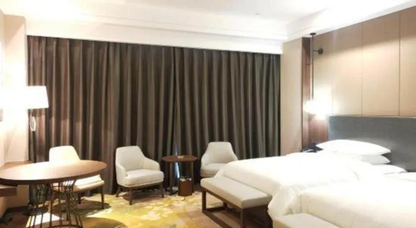 Bed in Venus Royal Hotel Ordos Yijinhuoluo Banner Olympic