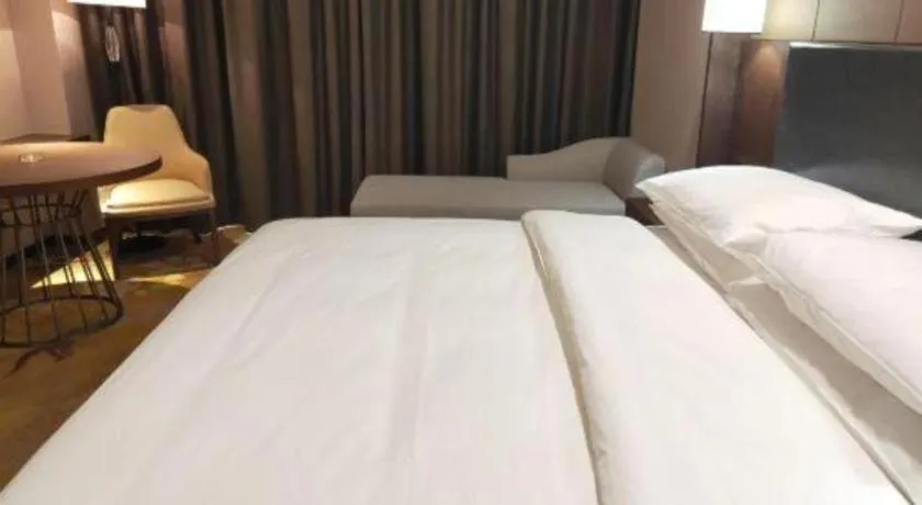 Bed in Venus Royal Hotel Ordos Yijinhuoluo Banner Olympic