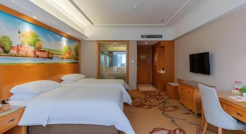 Bed in Vienna Hotel Guangdong Shaoguan Renhua Danxiashan County Center