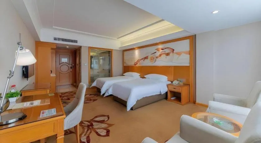 Bed in Vienna Hotel Guangdong Shaoguan Renhua Danxiashan County Center