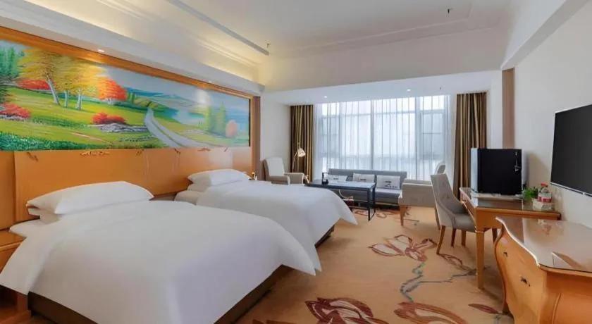 Bed in Vienna Hotel Guangdong Shaoguan Renhua Danxiashan County Center