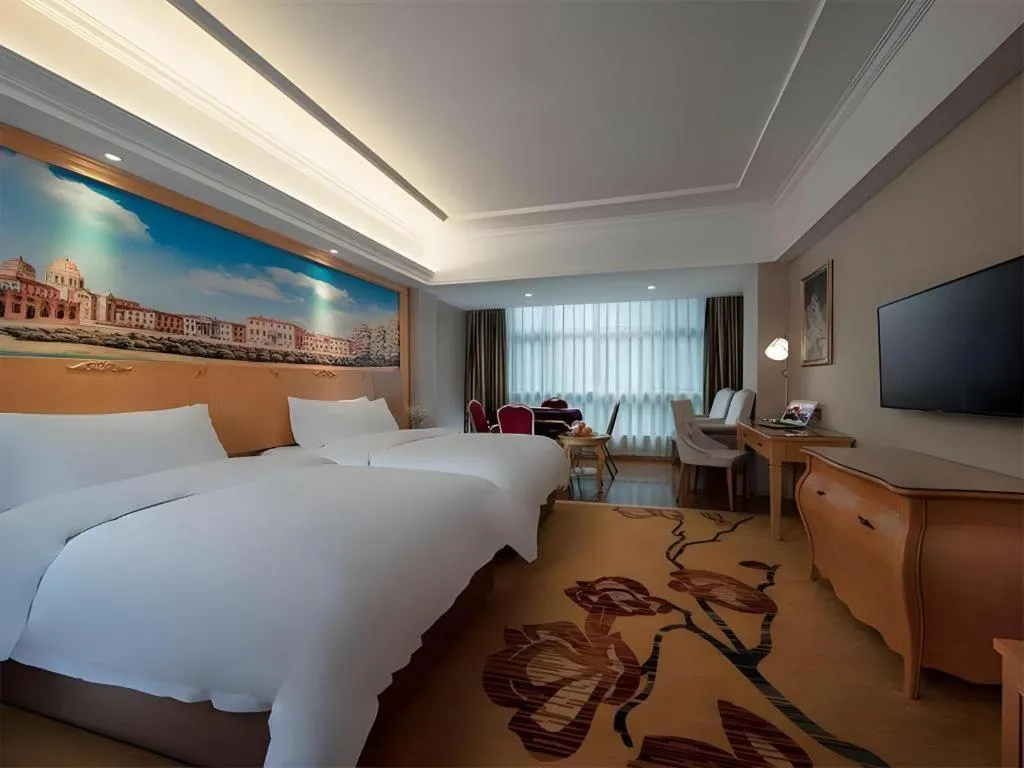 Bed in Vienna Hotel Guangdong Shaoguan Renhua Danxiashan County Center