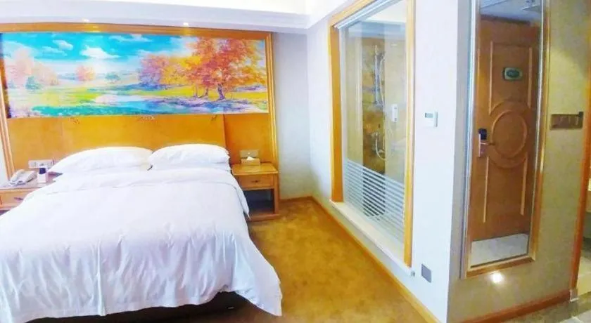 Bed in Vienna Hotel Guangdong Shaoguan Renhua Danxiashan County Center