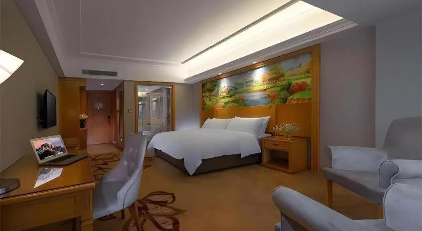 Bed in Vienna Hotel Guangdong Shaoguan Renhua Danxiashan County Center