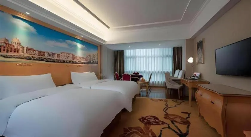 Bed in Vienna Hotel Guangdong Shaoguan Renhua Danxiashan County Center