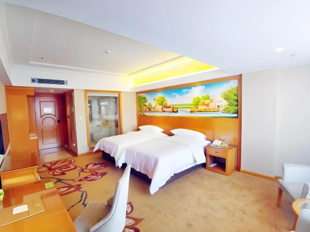 Bed in Vienna Hotel Guangdong Shaoguan Renhua Danxiashan County Center