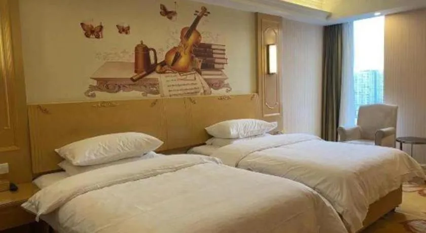 Bed in Vienna Hotel Chengdu Chadianzi Toursim Center