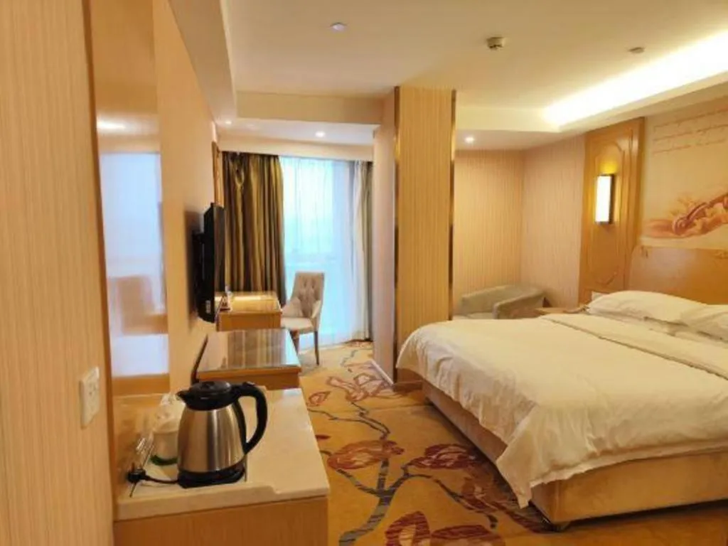 Bed in Vienna Hotel Chengdu Chadianzi Toursim Center