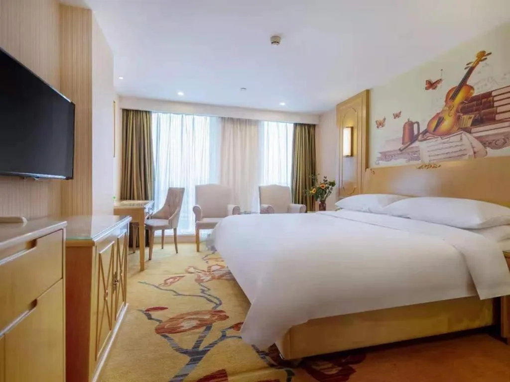 Bed in Vienna Hotel Chengdu Chadianzi Toursim Center