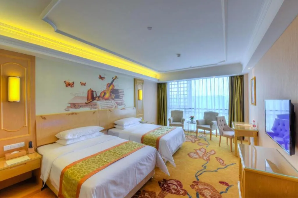 Bed in Vienna Hotel Chengdu Chadianzi Toursim Center