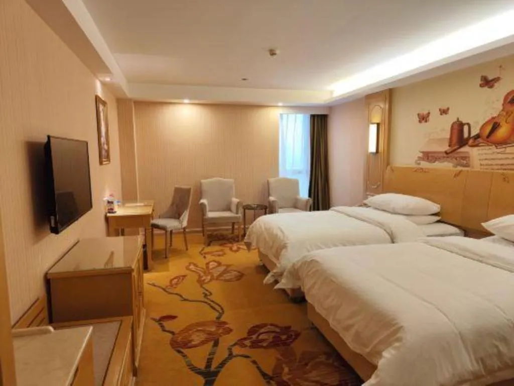 Bed in Vienna Hotel Chengdu Chadianzi Toursim Center